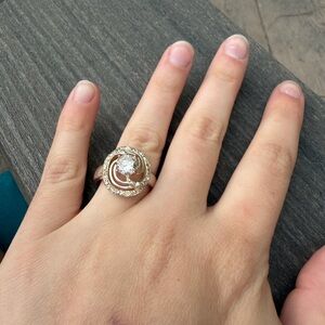 Elegant Gold and Silver Swirl Ring